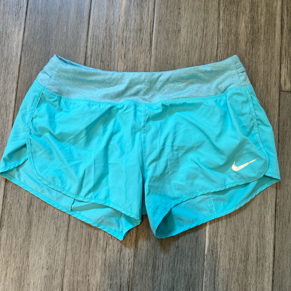 Nike Dri-FIT running shorts. Women’s. Size Medium. Light Blue.